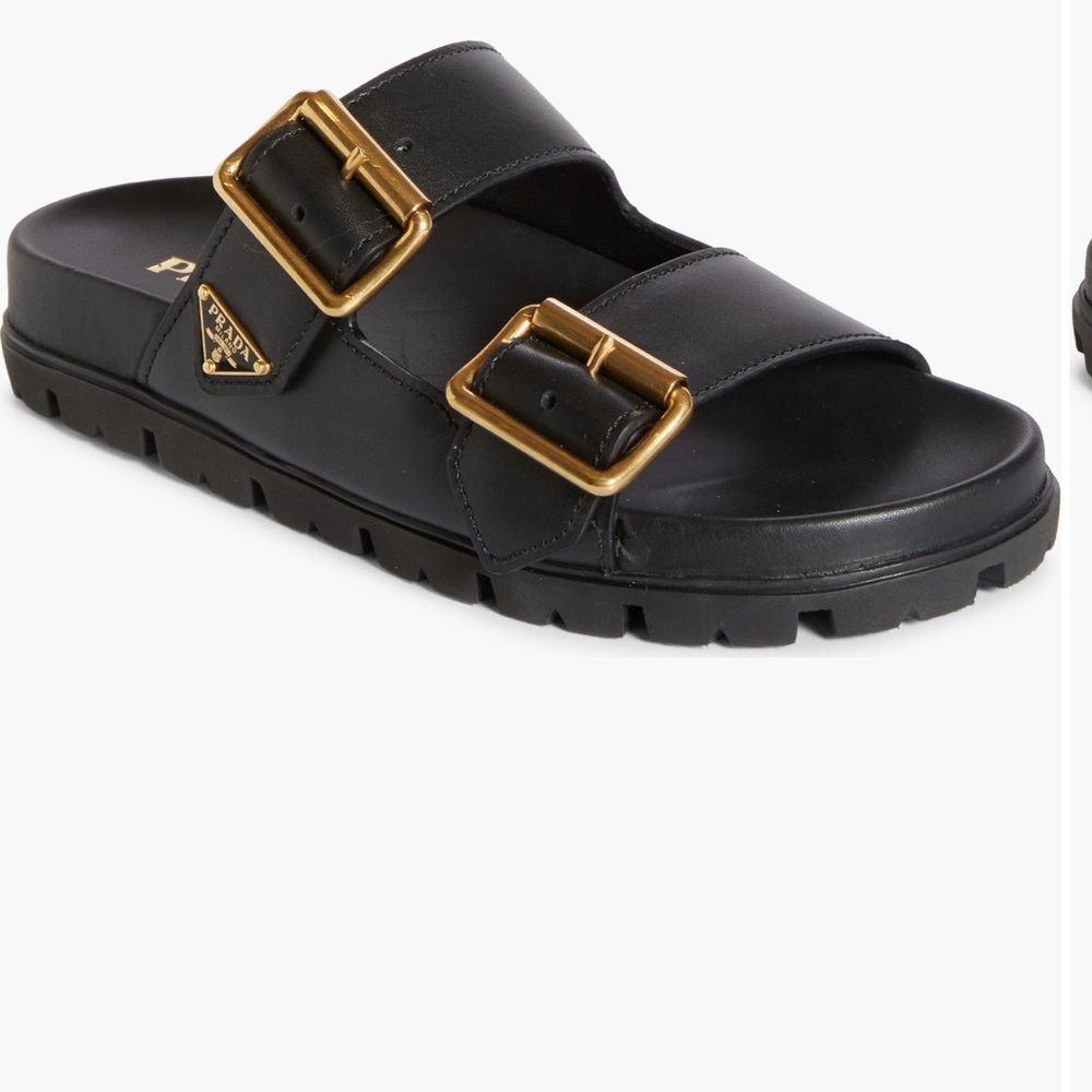 Prada Black Slides with Gold Accents. Used once .no box. Or dust bag